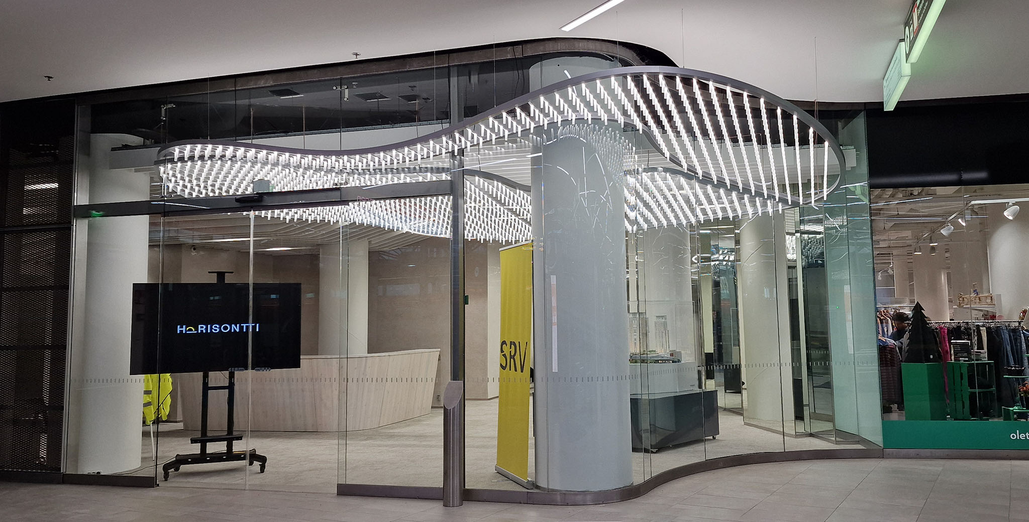 LED light canopy at the entrance of the REDI Horisontti T8 office building in Kalasatama, Helsinki